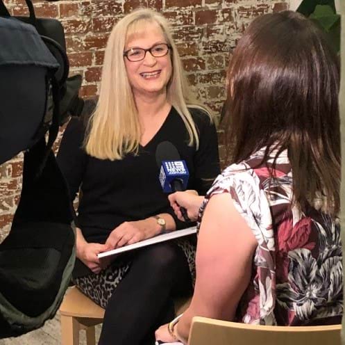 Victim Survivors’ Advisory Council Chair Jennifer Jackson giving a media interview